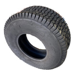 A heavy-duty black tyre with deep treads, 